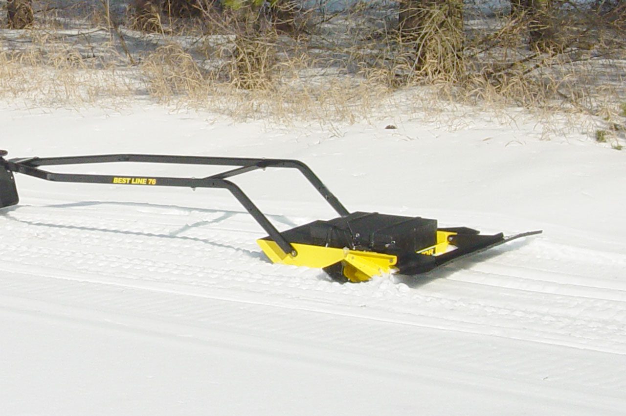 snow groomer leaving xc tracks