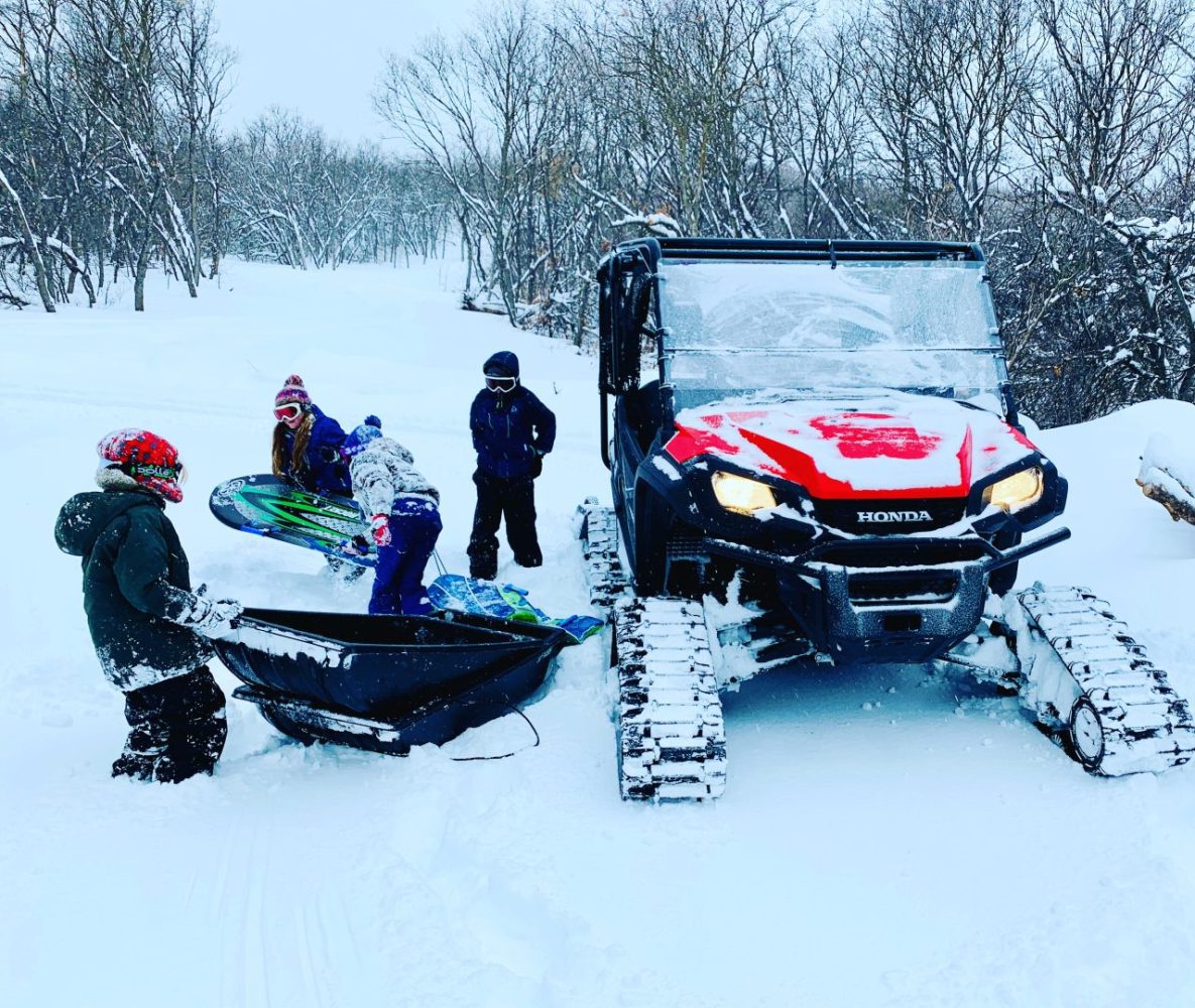 Cabin sledding hill snow groomed