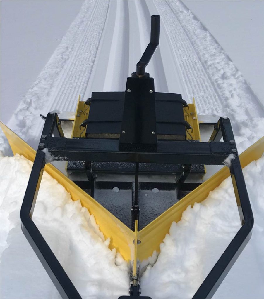 snow blaster leaving classic cross country ski tracks.