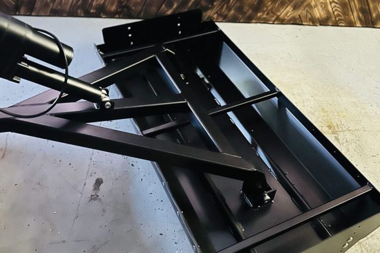 forced downward pan for harder packing of snow.